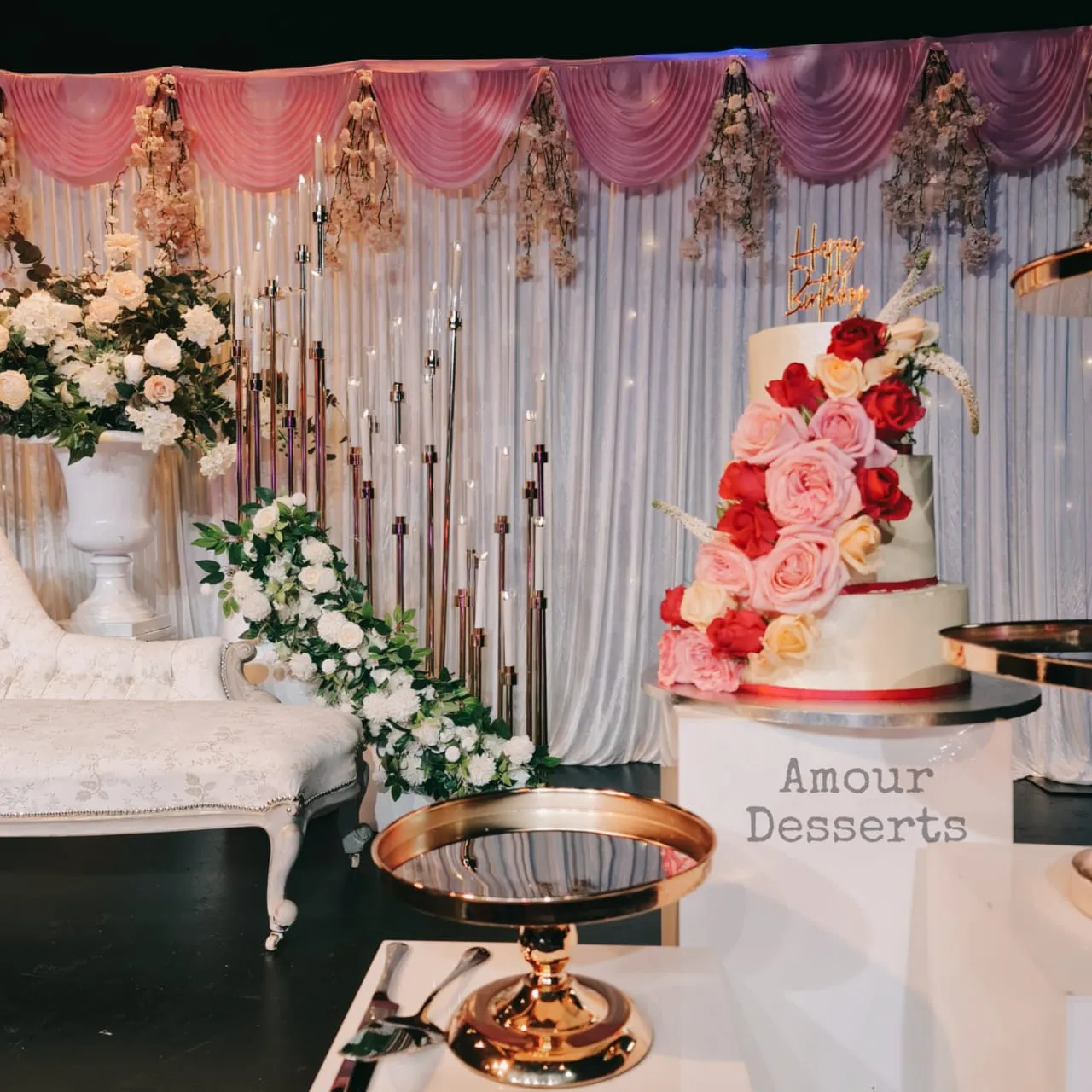 Tiered custom cake with cascading roses