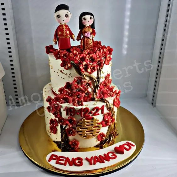 Red blossom custom cake with double happiness detail